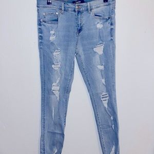 Aero ripped low rise skinny jeans